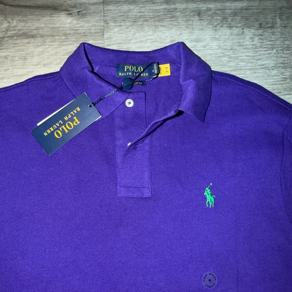 Purple Polo Shirt with Green Logo